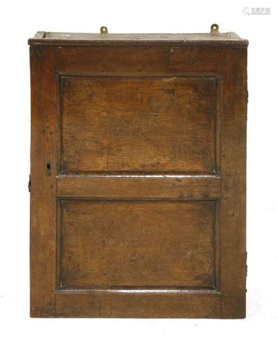 A small oak cupboard, 18th century, with a single …