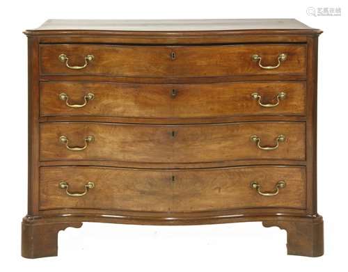 A George III mahogany serpentine commode chest, th…