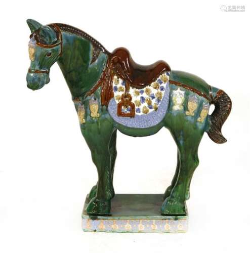 A large Tang style pottery horse, 20th century, of…