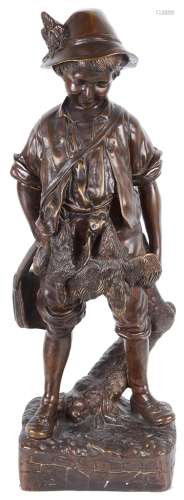 A 19th Century French Bronze Statue of a Young Hunter: The young boy holding ducks and a hare,