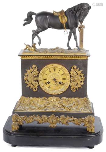 A 19th Century Russian Clock: The cast spelter figure to the top of a horse with saddle tied to a