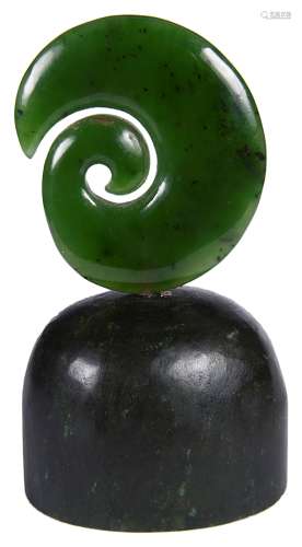 A Maori Nephrite Jade Koru Symbol: On nephrite base,