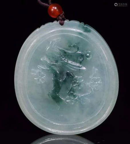 A JADEITE CARVED BIRD PATTERN CIRCLE PENDANT