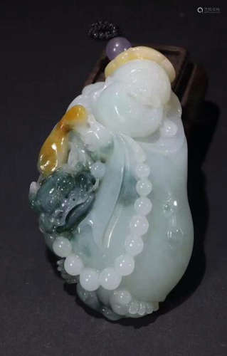 A JADEITE CARVED MAITREYA BUDDHA PENDANT