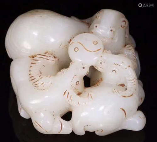 A HETIAN JADE CARVED SHEEP SHAPED PENDANT