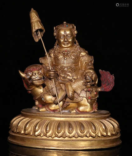 A GILT BRONZE CASTED WEALTH BUDDHA