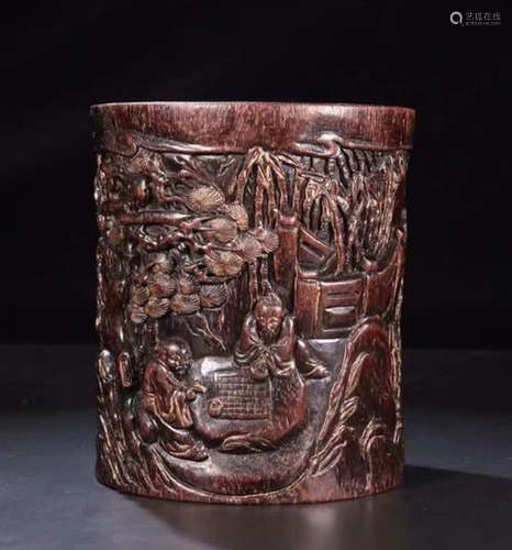 A ZITAN WOOD CARVED STORY PATTERN PEN HOLDER