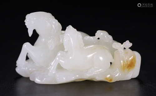 A HETIAN JADE CARVED SHEEP SHAPED PENDANT