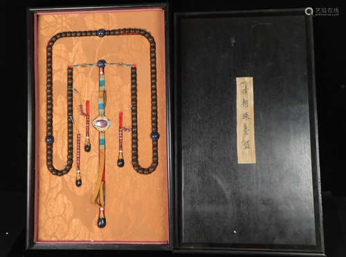 A CHENXIANG WOOD CARVED BEADS STRING NECKLACE