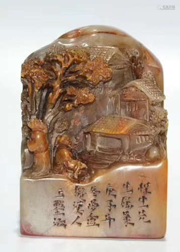 A SOAPTONE CARVED MOUNTAIN SHAPED SEAL