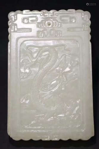 A HETIAN JADE CARVED DRAGON PATTERN PENDANT