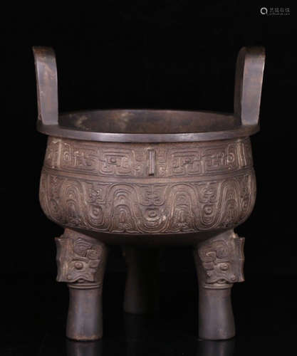 A BRONZE CASTED DOUBLE EAR TRIPOD CENSER