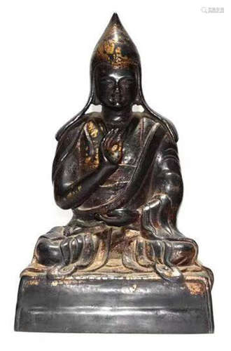 A BRONZE CASTED GURU BUDDHA