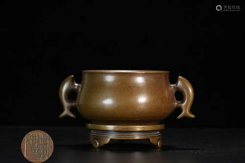 A BRONZE CASTED DOUBLE EAR CENSER