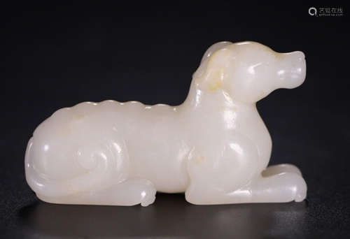 A HETIAN JADE CARVED DOG SHAPED PENDANT