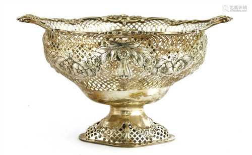 A pierced silver pedestal basket,