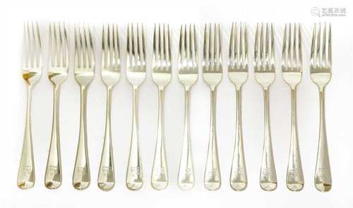 A set of twelve Victorian silver old English pattern table forks,