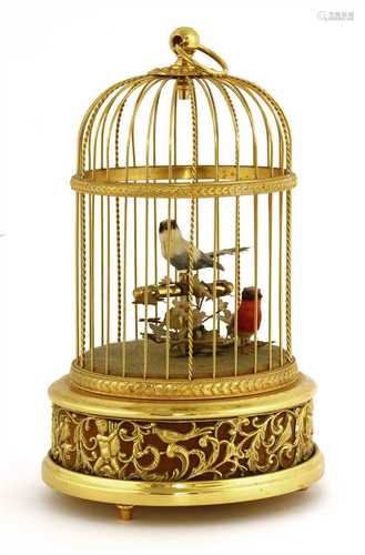 A Reuge musical birdcage automaton,