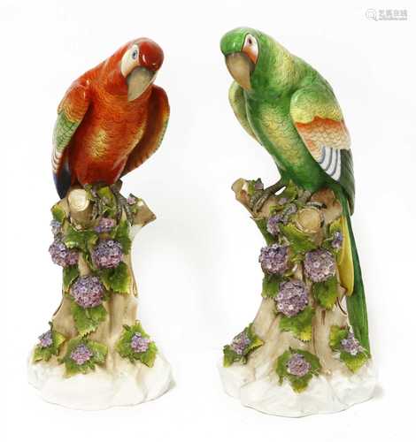 A pair of large German porcelain parrots