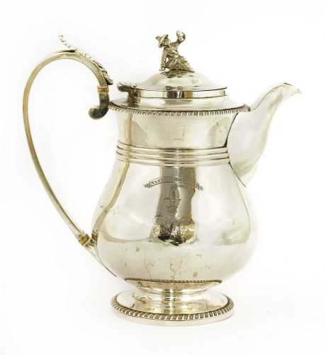 A George lV silver hot water jug