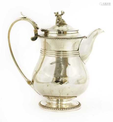 A George lV silver hot water jug