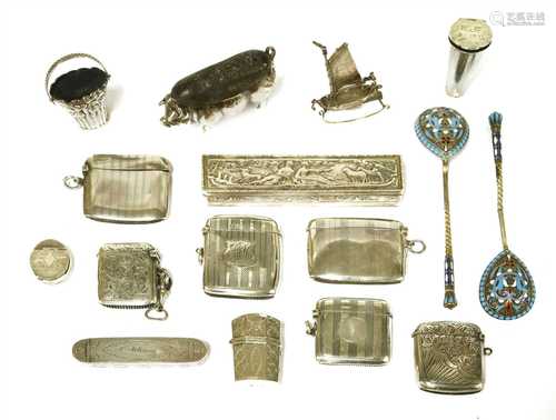 A collection of sixteen small silver items,