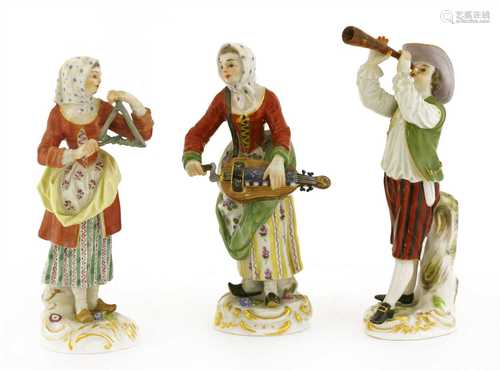 A collection of three Meissen porcelain figures,