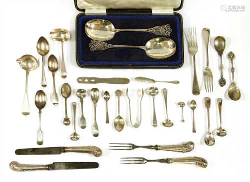A collection of silver flatware