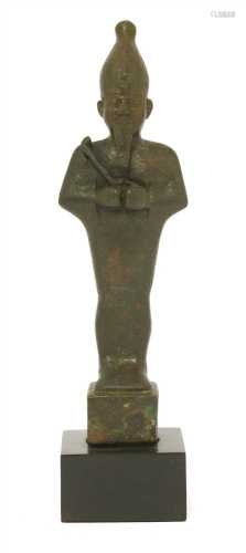 An Egyptian bronze figure of Osiris