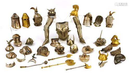 A collection of twenty miniature helmets and various armour