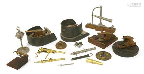 A collection of miniature model guns,