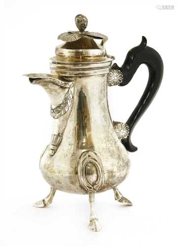 A silver hot water pot,
