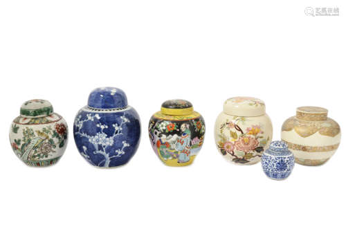 A collection of Chinese and Japanese ginger jars, including Famille Verte, blue and white and