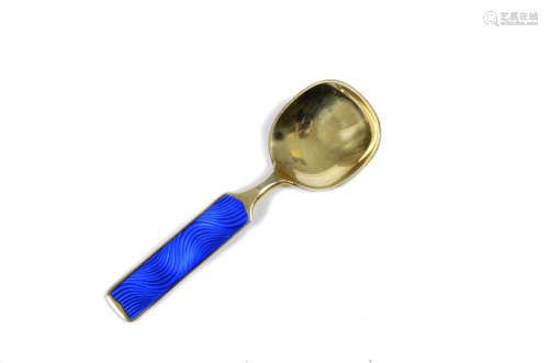 A Norwegian silver gilt and enamel spoon by Olsen, with a blue guilloche enamel, stamped 'Norway,