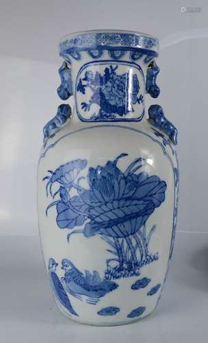 A 20th century blue and white Chinese vase with dog of fo shoulders, 38cm high.