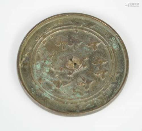 An Eastern Han Dynasty Chinese bronze mirror, 1-2nd century AD, depicting turtle and cranes.