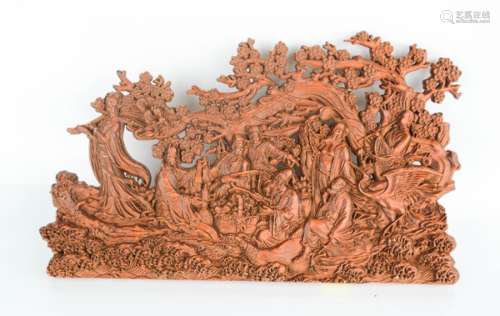A Chinese wooden carving depicting warriors, 28cm long.