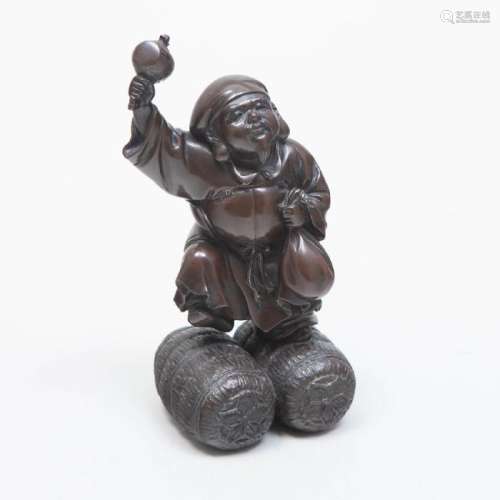 Japanese Bronze Figure of a Musician Standing on Rice
