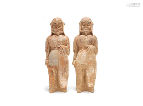 Tang Dynasty A pair of painted pottery figures of tomb guardians