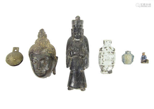 A bronze head of Buddha and other items