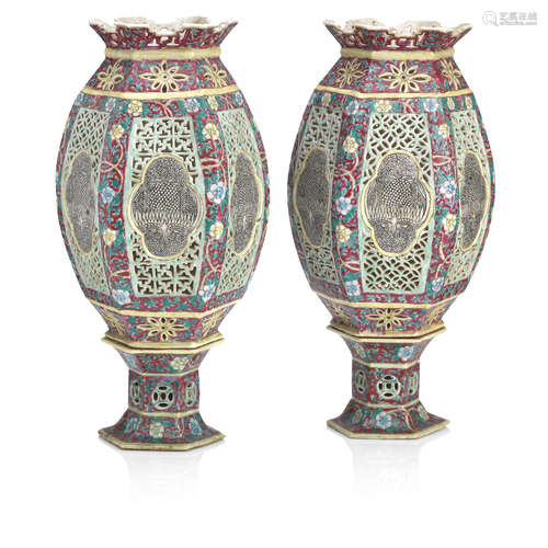 19th century A pair of ruby-ground famille rose lanterns