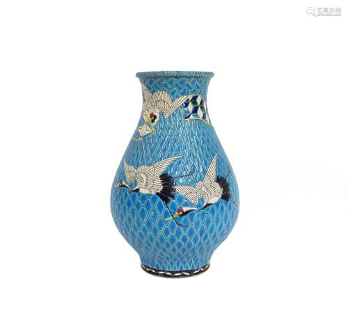 Circa 1900 An enamelled earthenware vase