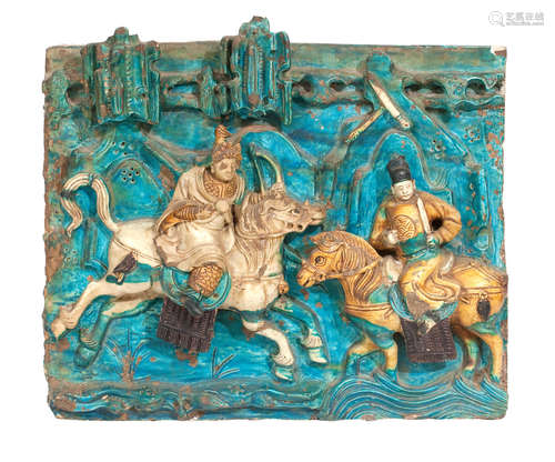 Ming dynasty A large sancai-glazed relief decorated pottery plaque