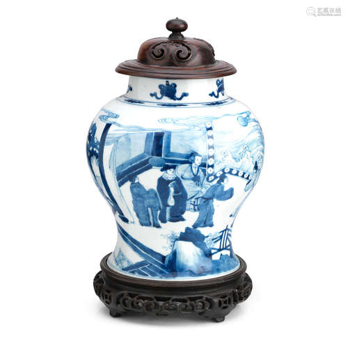 Kangxi period A blue and white jar with wood cover and stand