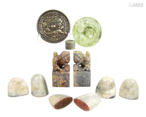 A green mineral bowl, various mineral desk seals and a bronze mirror