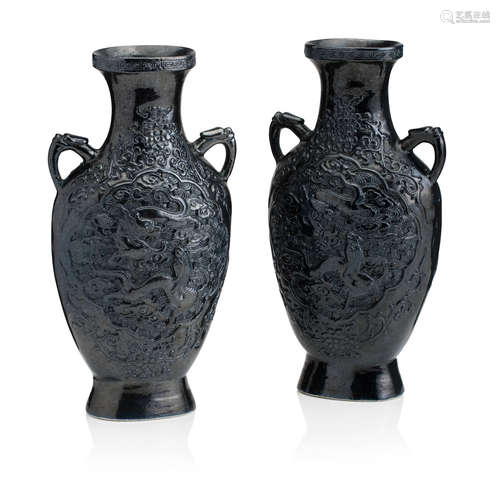 Bearing Qianlong seal mark but later A pair of black-glazed vases