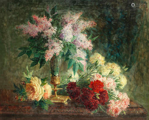 Pierre Eugène Montezin(French, 1874-1946) An arrangement of lilacs, roses and carnations