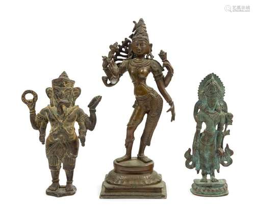 Three Indian Bronze Figures of Deities each standing,