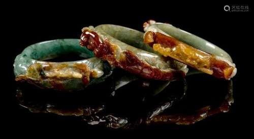 Three Chinese Russet and Green Jadeite Bangles