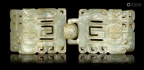 A Chinese Celadon Jade Belt Buckle of rounded